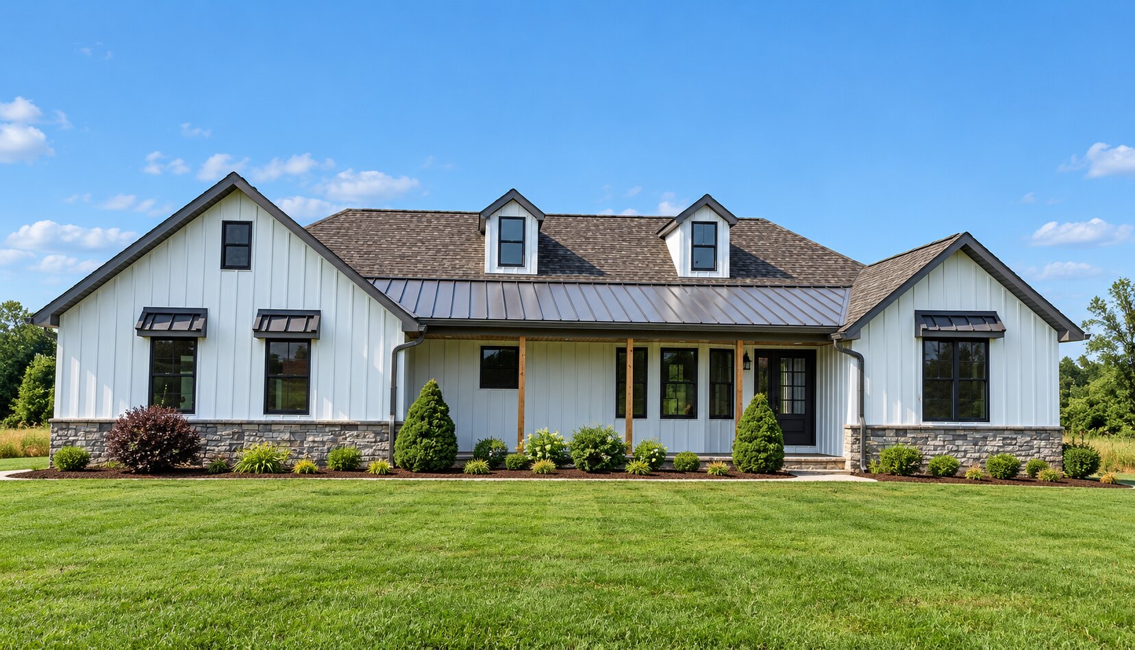 Completed Western Kentucky home with a shingle roof, standing-seam metal porch roof, and board-and-batten siding